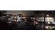 Night view of illuminated waterfront properties with boats docked along the canal at 13633 Britton Dr, Hudson, FL 34667