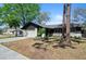 Charming home with a well-manicured lawn, attached garage, and mature landscaping at 13969 Gull Way, Clearwater, FL 33762