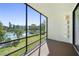 Enjoy the view of the pool and lush greenery from the private balcony of this condo at 14130 Rosemary Ln # 5206, Largo, FL 33774
