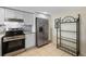 Updated kitchen equipped with stainless steel appliances and granite countertops at 14130 Rosemary Ln # 5206, Largo, FL 33774