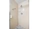 Tiled shower stall featuring chrome fixtures and pebble tile floor at 14130 Rosemary Ln # 5206, Largo, FL 33774