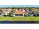 Aerial view of backyard and lake at 16145 Amethyst Key Dr, Wimauma, FL 33598