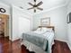 Comfortable bedroom with ceiling fan, closet, and charming nautical decor at 16145 Amethyst Key Dr, Wimauma, FL 33598