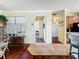 Bright foyer with a view into the kitchen and bar seating at 16145 Amethyst Key Dr, Wimauma, FL 33598