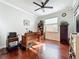 Bright office space with a large desk, shelving, and natural light perfect for working at home at 16145 Amethyst Key Dr, Wimauma, FL 33598