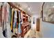 Walk-in closet with lots of storage and shelves at 1710 New Bedford Dr, Sun City Center, FL 33573