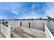 Private dock with seating overlooking the tranquil water, perfect for relaxing and enjoying the scenery at 1710 New Bedford Dr, Sun City Center, FL 33573