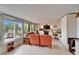 This Florida room offers lots of natural light and peaceful views of the water and backyard at 1710 New Bedford Dr, Sun City Center, FL 33573
