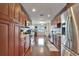 Spacious kitchen featuring wood floors, stainless steel appliances, and granite countertops at 1710 New Bedford Dr, Sun City Center, FL 33573