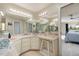Bathroom vanity features ample counter space and extra lighting at 2005 N Pointe Alexis Dr, Tarpon Springs, FL 34689