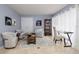 Cozy game room featuring comfortable seating, a convertible coffee table, and game-themed decor at 2005 N Pointe Alexis Dr, Tarpon Springs, FL 34689