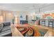 Spacious living room with vaulted ceilings, an open layout, and hardwood floors, ideal for entertaining at 217 2Nd Sw St, Largo, FL 33770