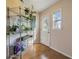 Functional mud room featuring plants and a door to the outside at 217 2Nd Sw St, Largo, FL 33770