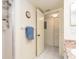 Bright bathroom featuring a walk-in shower and door leading to another room at 226 Woodlake Wynde, Oldsmar, FL 34677