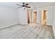 Open bedroom with ensuite bath and walk-in closet at 3032 Inlet Breeze Way, Holiday, FL 34691