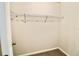 A walk-in closet with carpet and a wire shelving unit at 3032 Inlet Breeze Way, Holiday, FL 34691