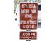 Key Vista Nature Park hours of operation sign, open at sunrise and closes at 7:00 PM at 3032 Inlet Breeze Way, Holiday, FL 34691