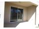 Covered patio features a large sliding glass door and concrete flooring at 3032 Inlet Breeze Way, Holiday, FL 34691