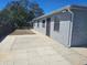 Exterior view with patio, perfect for outdoor entertaining at 3136 Primrose Dr, Holiday, FL 34691