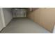 Spacious garage with an automatic door and finished flooring at 3136 Primrose Dr, Holiday, FL 34691
