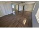 Large main bedroom featuring spacious closet and wood-look flooring at 3136 Primrose Dr, Holiday, FL 34691
