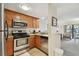 Efficient kitchen features stainless steel appliances and ample cabinet space at 36750 Us Highway 19 N # 01205, Palm Harbor, FL 34684