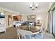 Open-concept living area with kitchen, living room, and dining table at 36750 Us Highway 19 N # 01205, Palm Harbor, FL 34684