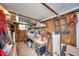 View of garage with storage, workbench, and tools at 3834 Kim Dr, Wesley Chapel, FL 33543