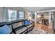 Open-concept living room flows into a modern kitchen with a breakfast bar at 3834 Kim Dr, Wesley Chapel, FL 33543