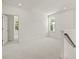 Spacious bedroom with white walls and carpet flooring, showing recessed lights and natural light at 408 W Paris St, Tampa, FL 33604