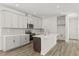 Bright kitchen with stainless appliances, a center island, and sleek cabinets at 408 W Paris St, Tampa, FL 33604
