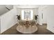 Cozy dining room featuring a round table, modern chairs, and natural light for enjoyable meals at 410 W Paris St, Tampa, FL 33604