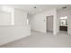 An upstairs hallway leading to a bathroom featuring a double vanity at 410 W Paris St, Tampa, FL 33604