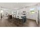 Open concept living area featuring a kitchen island with bar seating and seamlessly connects to a cozy living space at 410 W Paris St, Tampa, FL 33604