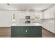 Spacious kitchen features a large center island with countertop space and modern finishes for cooking and gathering at 410 W Paris St, Tampa, FL 33604