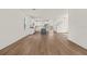Spacious open-concept home with wood floors and views of the kitchen and staircase at 410 W Paris St, Tampa, FL 33604