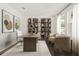 Stylish home office with built-in shelving, modern decor, and an abundance of natural light, perfect for working at 410 W Paris St, Tampa, FL 33604