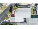 Aerial view of the property showcasing the roof, landscaping, and surrounding neighborhood at 4851 W Gandy Blvd # B3L35, Tampa, FL 33611