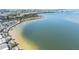 Aerial view of a waterfront community with beach access, palm trees, and neighborhood streets at 4851 W Gandy Blvd # B3L35, Tampa, FL 33611
