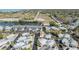 Scenic aerial view of a charming neighborhood with lush green trees and waterfront access at 4851 W Gandy Blvd # B3L35, Tampa, FL 33611