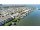 Wide aerial view of a waterfront community with boat docks and mature landscaping at 4851 W Gandy Blvd # B3L35, Tampa, FL 33611
