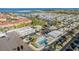 Scenic aerial view of community featuring waterfront access, pool, clubhouse, and convenient parking at 4851 W Gandy Blvd # B3L35, Tampa, FL 33611