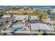 Aerial view of community amenities, including a pool, clubhouse, and shuffleboard court at 4851 W Gandy Blvd # B3L35, Tampa, FL 33611