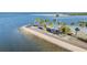 Scenic aerial view of waterfront with palm trees, picnic tables, and recreational area for outdoor activities at 4851 W Gandy Blvd # B3L35, Tampa, FL 33611