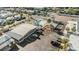 Aerial view of community pool, shuffleboard court, clubhouse, and ample parking spaces at 4851 W Gandy Blvd # B3L35, Tampa, FL 33611