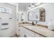 Bright bathroom with stylish vanity, granite countertop, modern fixtures, and ample storage at 4851 W Gandy Blvd # B3L35, Tampa, FL 33611