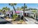 Charming home featuring a covered carport, a welcoming front porch, and lovely landscaping at 4851 W Gandy Blvd # B3L35, Tampa, FL 33611