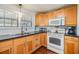 The well-organized kitchen has ample counter space and stainless steel double sinks at 4851 W Gandy Blvd # B3L35, Tampa, FL 33611