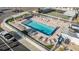 Aerial view showcasing the community pool area with lounge chairs and well-maintained landscaping at 4851 W Gandy Blvd # B3L35, Tampa, FL 33611
