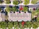 An aerial view of townhome roofs and greenery, highlighting community layout at 4910 Pond Ridge Dr, Riverview, FL 33578